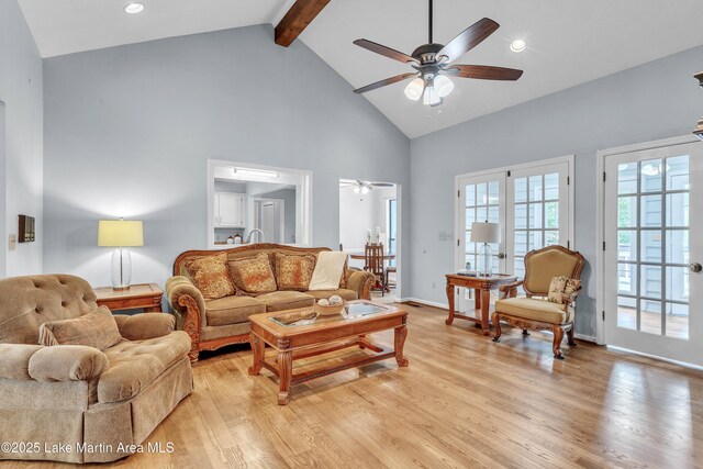 226 Auburn Dr, Alexander City, AL 35010 - living area with high vaulted ceiling, a ceiling fan, light wood-type flooring, and beamed ceiling