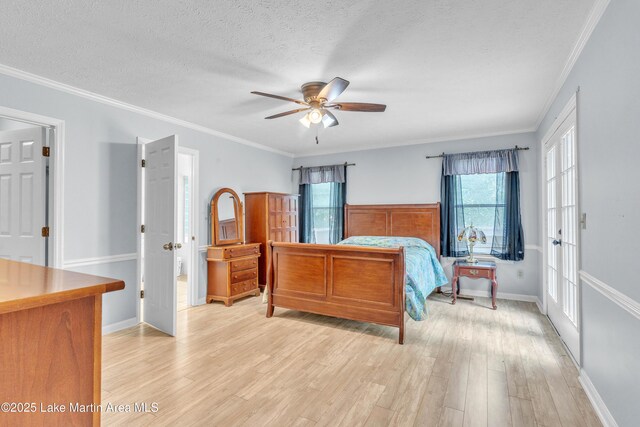 226 Auburn Dr, Alexander City, AL 35010 - bedroom with light wood-type flooring, a textured ceiling, a ceiling fan, and ornamental molding