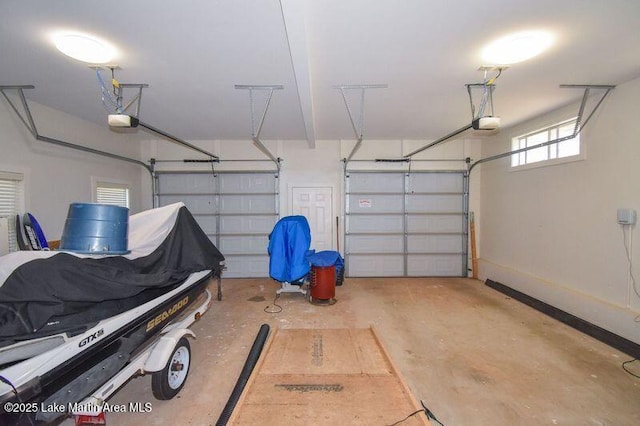 garage featuring a garage door opener