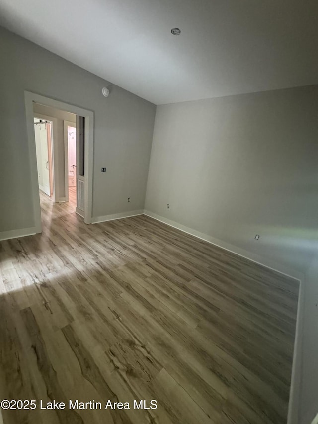 27 Bob Lo Dr, Dadeville, AL 36853 - empty room featuring wood finished floors and baseboards