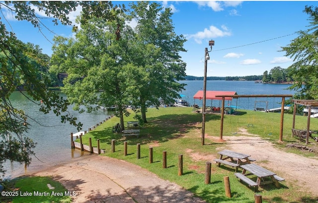27 Bob Lo Dr, Dadeville, AL 36853 - view of community with a water view, a lawn, a boat ramp, and a dock