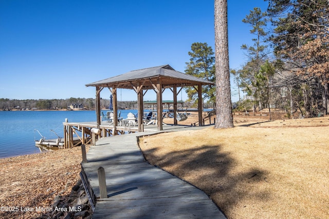 dock area featuring a gazebo and a water view