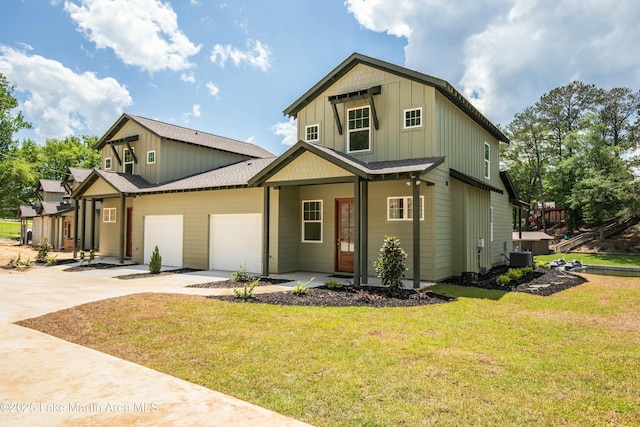 view of front of house featuring concrete driveway, an attached garage, board and batten siding, a front yard, and cooling unit