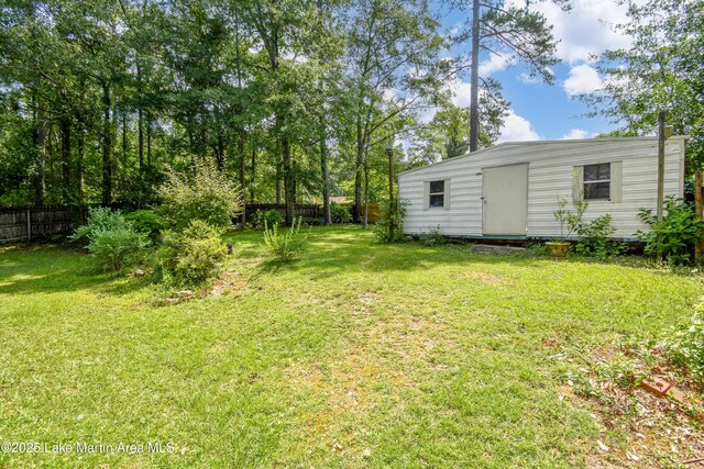 300 Hornsby Dr, Tallassee, AL 36078 - view of yard featuring an outbuilding
