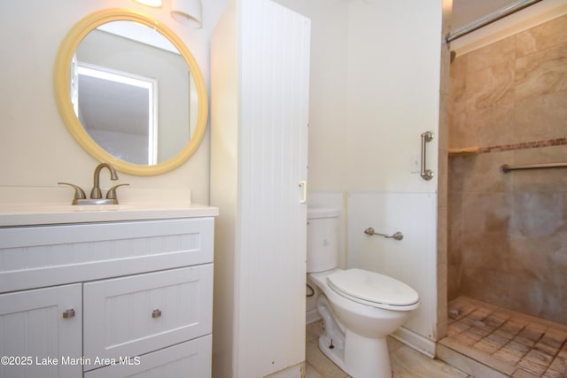 300 Hornsby Dr, Tallassee, AL 36078 - full bathroom with tiled shower, vanity, and toilet