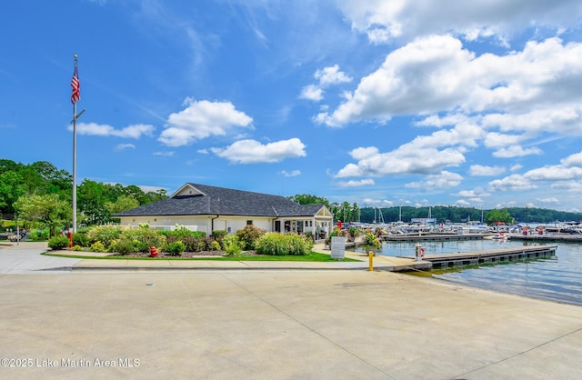 dock area with a water view
