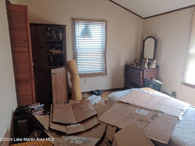 bedroom featuring crown molding