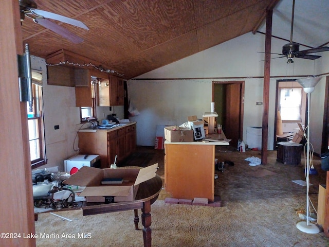 kitchen featuring carpet floors, high vaulted ceiling, ceiling fan, and wood ceiling