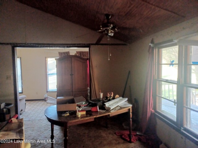 carpeted living room with plenty of natural light and ceiling fan