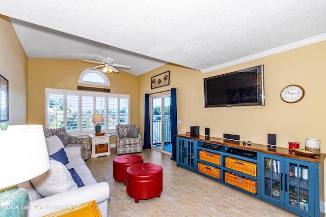 living room featuring a textured ceiling, ceiling fan, crown molding, and lofted ceiling