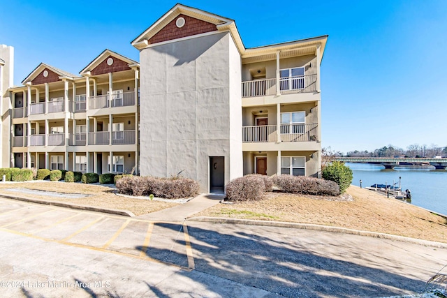 view of building exterior featuring a water view