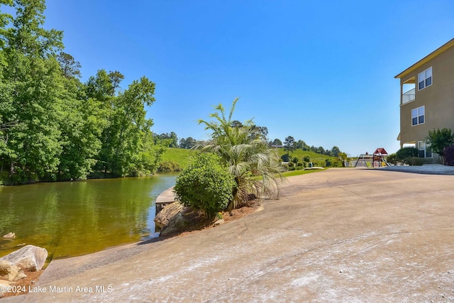 view of home's community featuring a water view