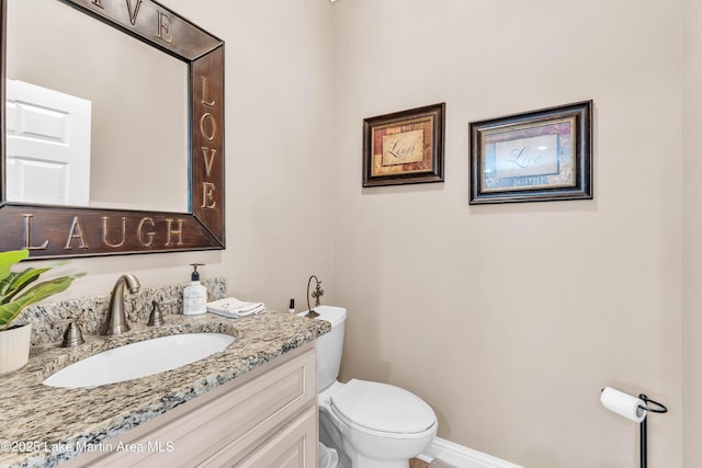 141 2nd St, Eclectic, AL 36024 - bathroom with vanity and toilet