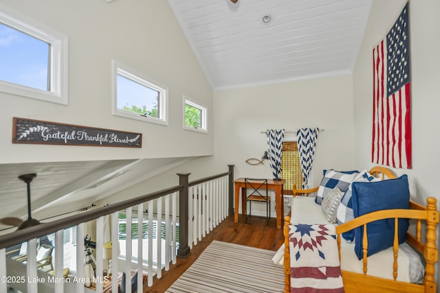 421 Mccain Rd, Eclectic, AL 36024 - hall featuring wood finished floors, high vaulted ceiling, and crown molding