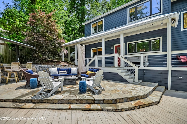 421 Mccain Rd, Eclectic, AL 36024 - wooden terrace featuring an outdoor fire pit
