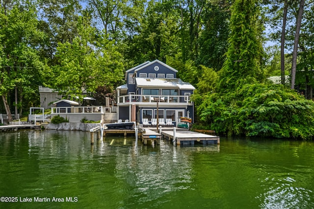421 Mccain Rd, Eclectic, AL 36024 - rear view of property with a water view and a balcony