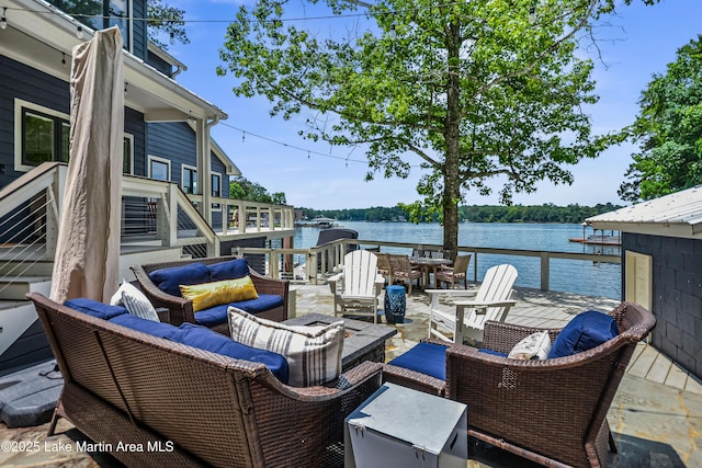 421 Mccain Rd, Eclectic, AL 36024 - view of patio with an outdoor living space and a water view