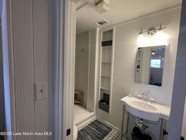 421 Mccain Rd, Eclectic, AL 36024 - bathroom featuring tile patterned flooring and a sink