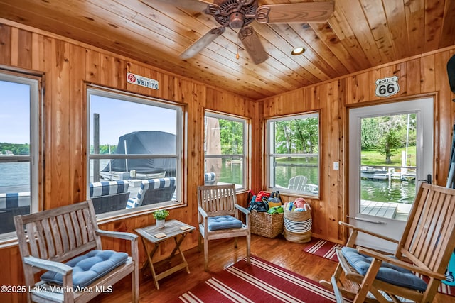 421 Mccain Rd, Eclectic, AL 36024 - sunroom featuring wood walls, a water view, wood finished floors, and wood ceiling