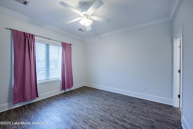 spare room featuring crown molding, dark hardwood / wood-style floors, and ceiling fan