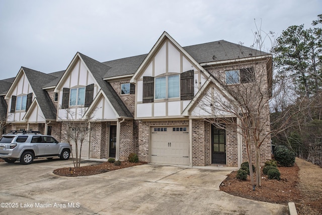 tudor-style house with a garage