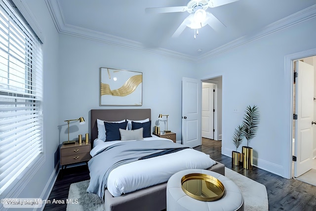 bedroom with dark hardwood / wood-style flooring, crown molding, and ceiling fan