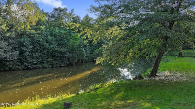 view of landscape with a water view