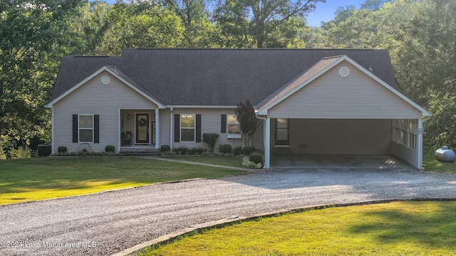 single story home featuring a carport and a front yard