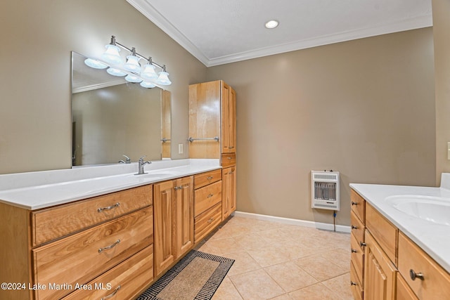 bathroom with tile patterned flooring, vanity, crown molding, and heating unit