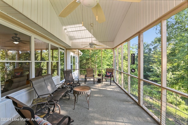 sunroom / solarium with vaulted ceiling