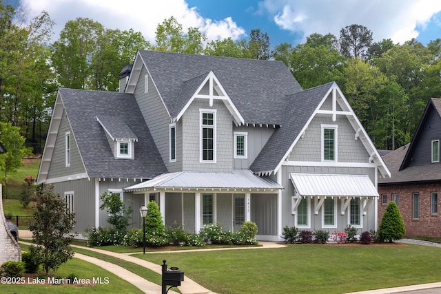1412 Annalue Dr, Auburn, AL 36830 - view of front of home with roof with shingles, a front yard, a standing seam roof, metal roof, and board and batten siding