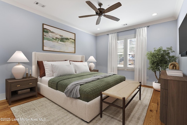 1412 Annalue Dr, Auburn, AL 36830 - bedroom featuring light wood-style flooring, baseboards, recessed lighting, a ceiling fan, and ornamental molding