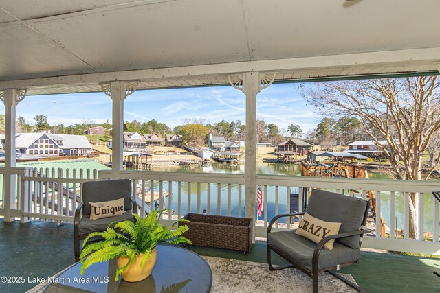 100 Royal Dr, Equality, AL 36026 - view of patio featuring a residential view, a balcony, and a water view