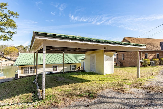 100 Royal Dr, Equality, AL 36026 - view of side of home with crawl space, a yard, and central AC unit
