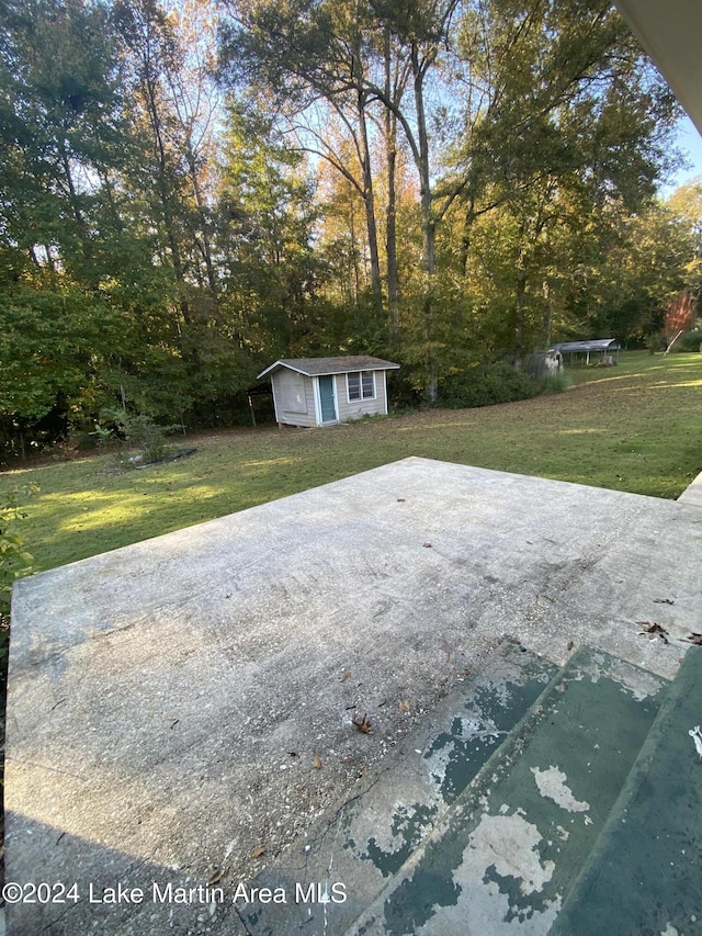 view of patio with an outdoor structure