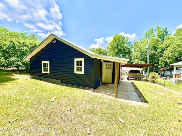 exterior space featuring a front lawn