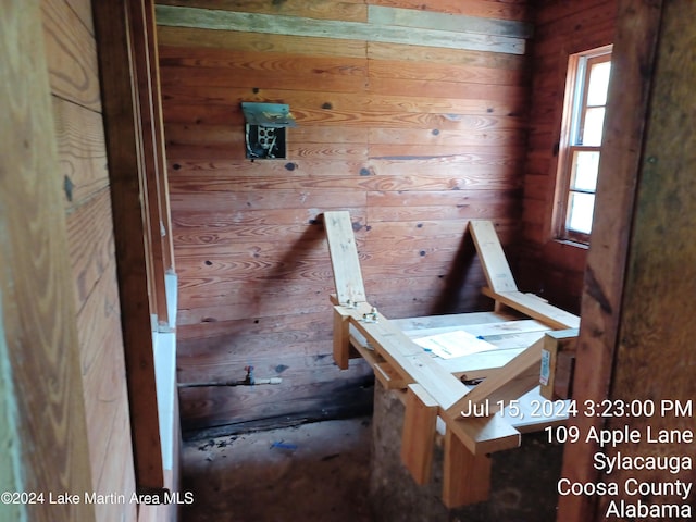 interior space featuring wood walls