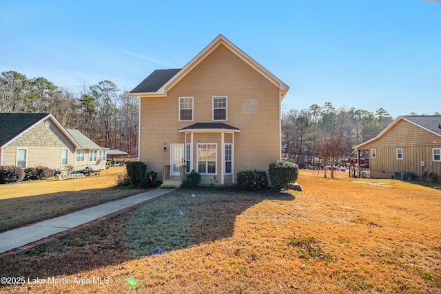 view of front of home with a front lawn