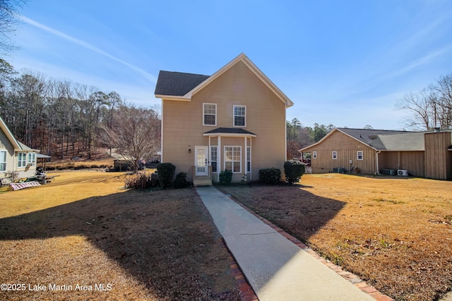 view of front of house featuring a front lawn