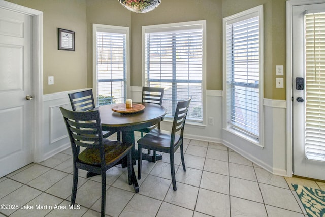 dining room with light tile patterned flooring