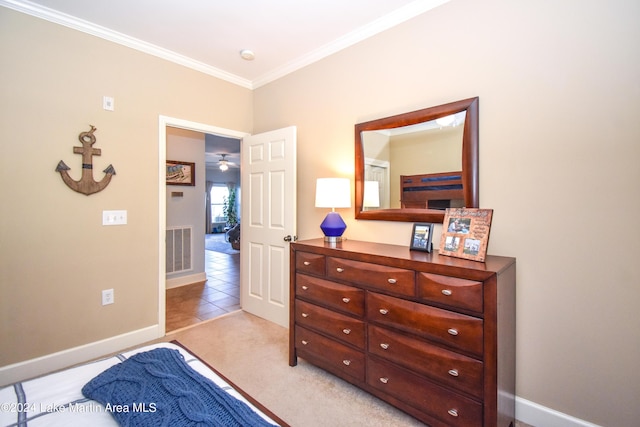 carpeted bedroom with crown molding