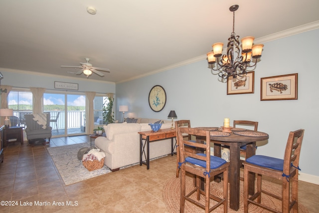 tiled dining space featuring crown molding and ceiling fan with notable chandelier