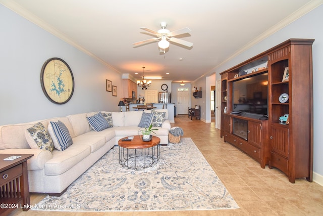 living room featuring ceiling fan with notable chandelier, ornamental molding, and light tile patterned floors