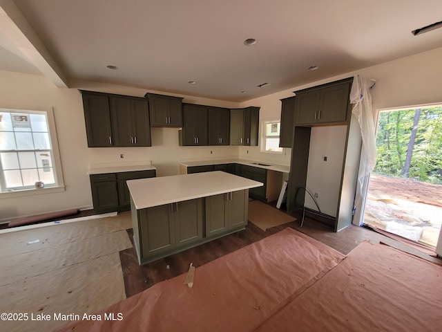 214 Mccain Rd, Eclectic, AL 36024 - kitchen with a kitchen island and wood finished floors