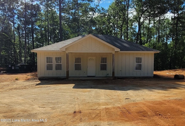 214 Mccain Rd, Eclectic, AL 36024 - view of front of house with board and batten siding and roof with shingles