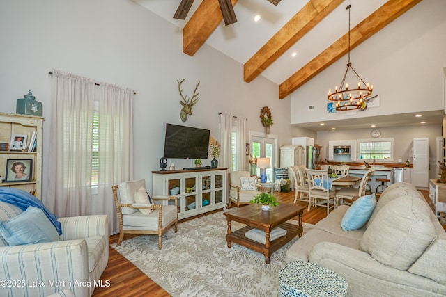 24 Hideaway Cir, Jacksons Gap, AL 36861 - living area featuring beam ceiling, high vaulted ceiling, ceiling fan with notable chandelier, recessed lighting, and wood finished floors