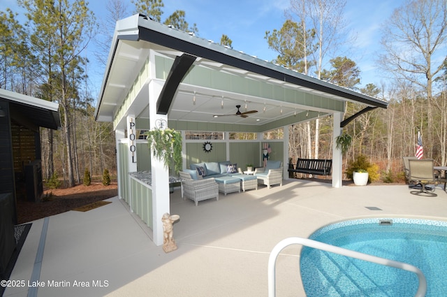 view of pool featuring a gazebo, an outdoor hangout area, ceiling fan, and a patio area