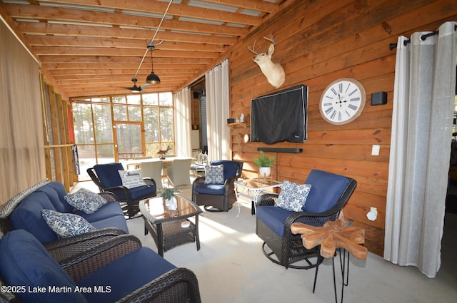 sunroom / solarium with lofted ceiling