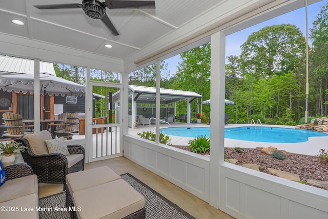 24 Hideaway Cir, Jacksons Gap, AL 36861 - sunroom featuring a ceiling fan, outdoor lounge area, and a wealth of natural light