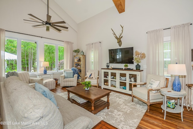 24 Hideaway Cir, Jacksons Gap, AL 36861 - living area with ceiling fan, wood finished floors, beam ceiling, and high vaulted ceiling